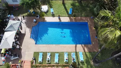 an overhead view of a swimming pool in a yard at Villa Serena - Casa rural en Arcos con piscina, barbacoa, chimenea in Arcos de la Frontera