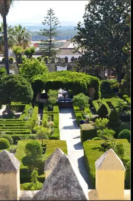 a view of a garden with a walkway at El Patio de María 2 in Bornos