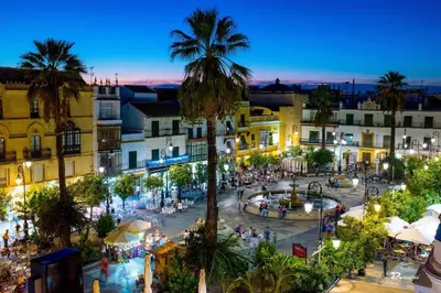 an overhead view of a city at night at Casa Lotte, centro histórico,AC, garaje, wifi in Sanlúcar de Barrameda