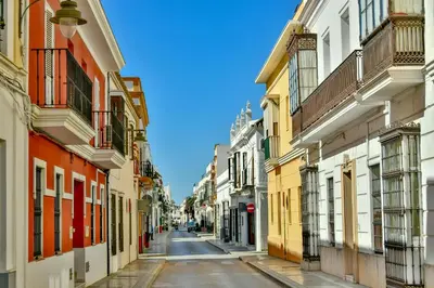 an empty street in a city with buildings at Holiday Homes - Ocean Costa Ballena in Cádiz