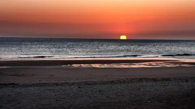 people riding horses on the beach at sunset at Townhouse in La Loma de Sancti Petri , 3 Bedrooms, Pool, Pedal Tennis in Novo Sancti Petri