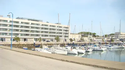 a bunch of boats are docked in a marina at Apartamento Marina el Puerto in El Puerto de Santa María
