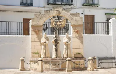 a statue of two men in front of a building at Beautiful Home In Arcos De La Frontera in Arcos de la Frontera
