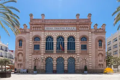 a large brick building with a sign on it at The House of Colors by Cadiz Time in Cádiz