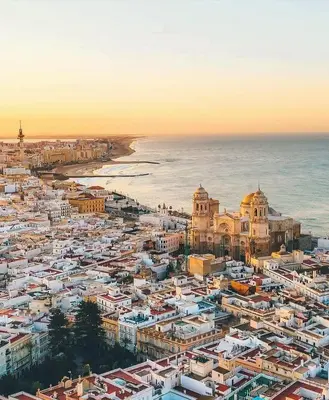 an aerial view of a city next to the ocean at No 10 Cádiz in Cádiz