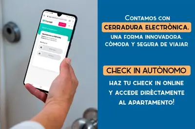 a person holding a cell phone in their hand at ACQUARELA Family Home free parking by Cadiz4Rentals in Cádiz