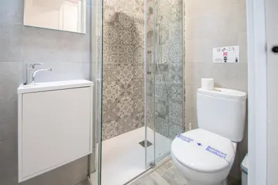 a bathroom with a toilet and a shower at Estudio Al Sur de Cádiz in Cádiz