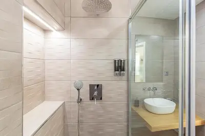 a bathroom with a shower and a sink at Allo Apartments San Roque Bajo B in Cádiz