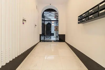 an empty hallway with a gate in a building at Allo Apartments San Roque 2ºB in Cádiz
