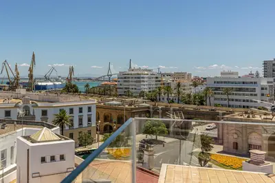 a view of a city from a balcony at Allo Apartments San Roque 2ºB in Cádiz